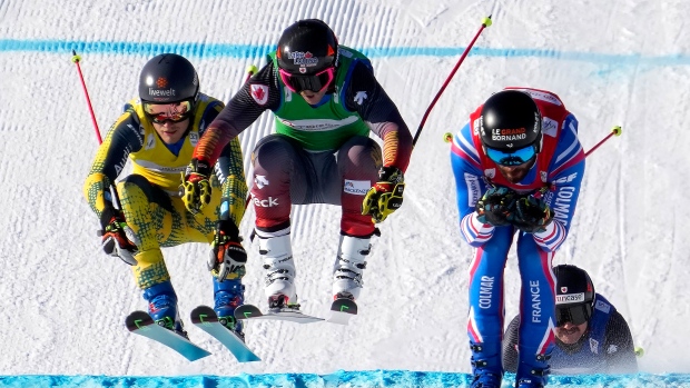 From left, Tim Hronek of Germany, Brady Leman of Canada, and Bastien Midol of France