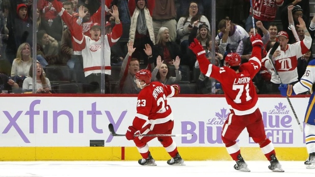 Lucas Raymond and Red Wings Celebrate , The Canadian Press Lucas Raymond and Red Wings Celebrate