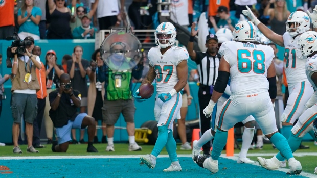 Myles Gaskin, Miami Dolphins celebrate, The Canadian Press Myles Gaskin, Miami Dolphins celebrate