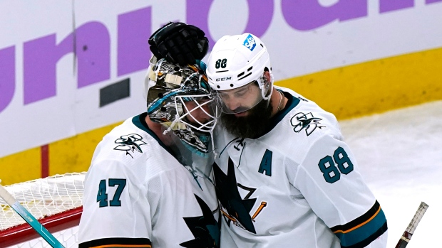 San Jose Sharks goaltender James Reimer and Brent Burns, The Canadian Press San Jose Sharks goaltender James Reimer and Brent Burns