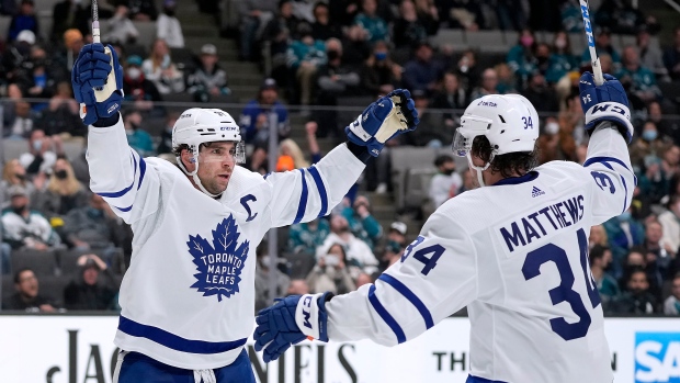 John Tavares and Auston Matthews celebrate