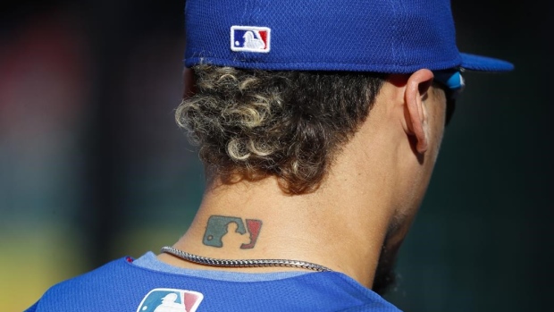 Javier Baez MLB logo, The Canadian Press Javier Baez MLB logo