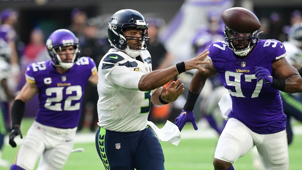 Everson Griffen Harrison Smith Russell Wilson, John Autey / MediaNews Group / St. Paul Pioneer Press via Getty Images Everson Griffen Harrison Smith Russell Wilson