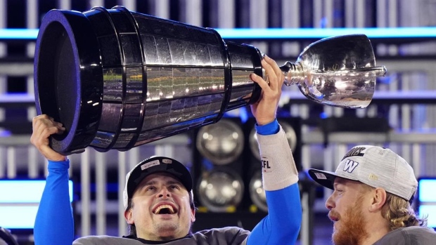 Zach Collaros with the Grey Cup, The Canadian Press Zach Collaros with the Grey Cup