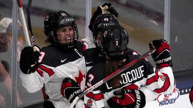 Team Canada celebrates, The Canadian Press Team Canada celebrates