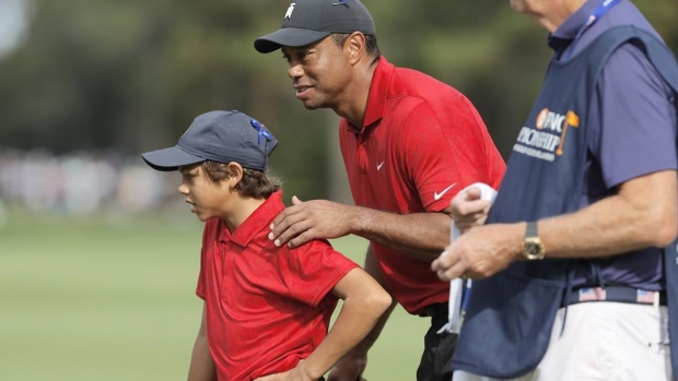 Tiger & son's 11 straight birdies fall short of Daly duo Article Image 0