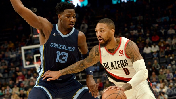 Damian Lillard Jaren Jackson Jr., The Canadian Press Damian Lillard Jaren Jackson Jr.