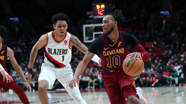 Anfernee Simons Darius Garland, The Canadian Press Anfernee Simons Darius Garland