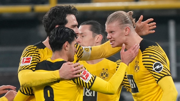 Dortmund's Erling Haaland, right, celebrates with his teammates