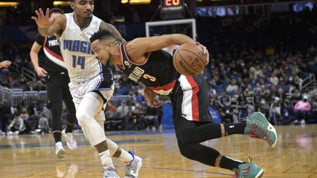 Gary Harris and CJ McCollum, The Canadian Press Gary Harris and CJ McCollum