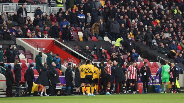 Brentford, Wolverhampton players escorted off the field, The Canadian Press Brentford, Wolverhampton players escorted off the field