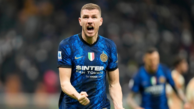 Edin Dzeko, The Canadian Press Edin Dzeko