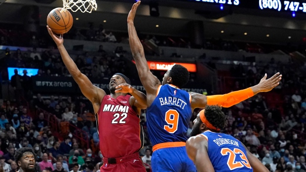 Four reach 20 points in Heat's win over Knicks