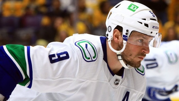 Canucks' J.T. Miller reacts to fans throwing jerseys