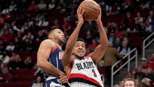 Eric Gordon CJ McCollum, The Canadian Press Eric Gordon CJ McCollum