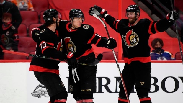 Thomas Chabot Tim Stutzle Austin Watson, The Canadian Press Thomas Chabot Tim Stutzle Austin Watson