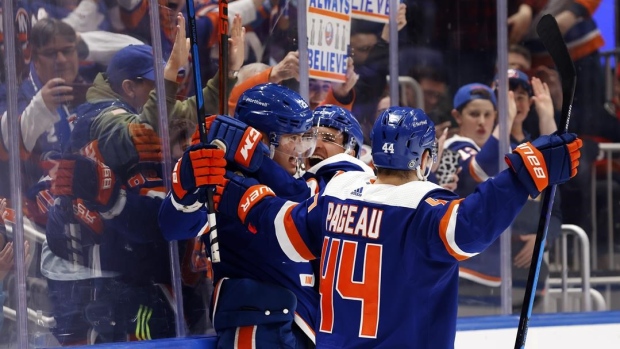 New York Islanders celebrate, The Canadian Press New York Islanders celebrate