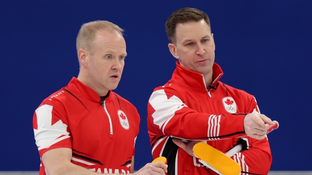 Mark Nichols and Brad Gushue, Getty Images Mark Nichols and Brad Gushue