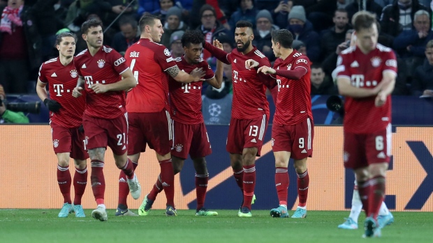Kingsley Coman celebrates with Bayern Munich teammates, The Canadian Press Kingsley Coman celebrates with Bayern Munich teammates