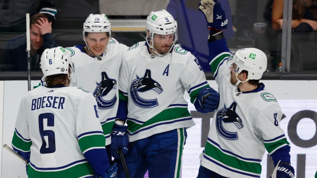 Vancouver Canucks celebrate, The Canadian Press Vancouver Canucks celebrate