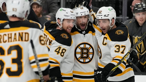 Craig Smith, Bruins celebrate, The Canadian Press Craig Smith, Bruins celebrate