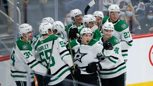 Dallas Stars celebrate Jason Robertson OT winner