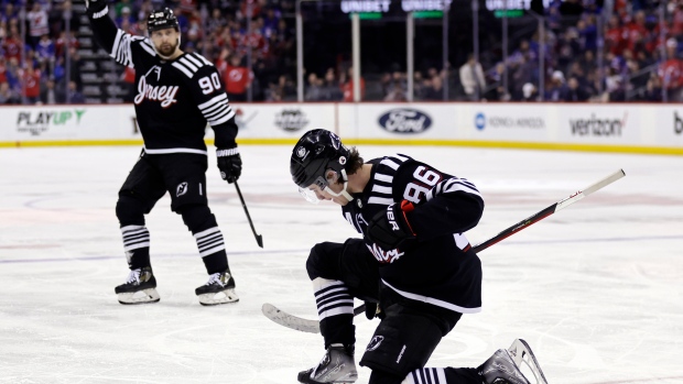 Jack Hughes Scores Twice as Devils Top the Red Wings in Season