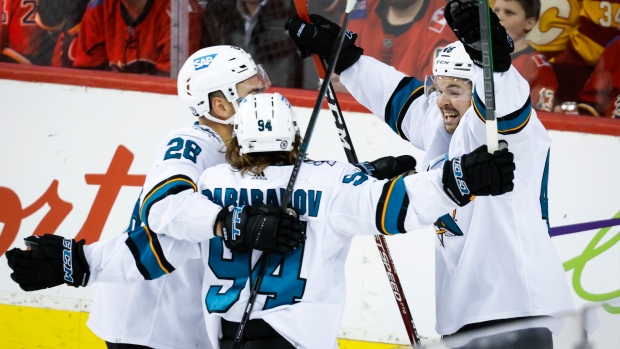 Alexander Barabanov, centre, Timo Meier, left, and Tomas Hertl