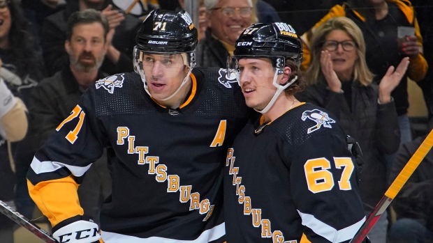 Evgeni Malkin Rickard Rakell, The Canadian Press Evgeni Malkin Rickard Rakell