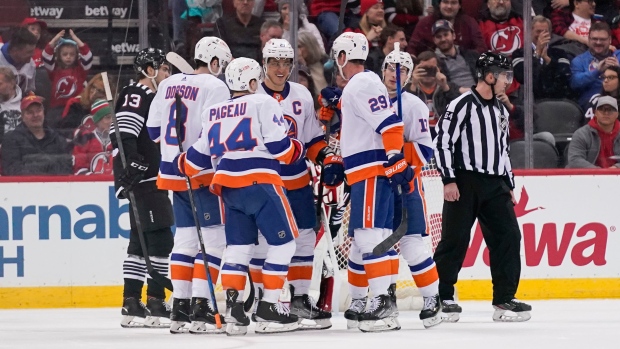 New York Islanders celebrate, The Canadian Press New York Islanders celebrate