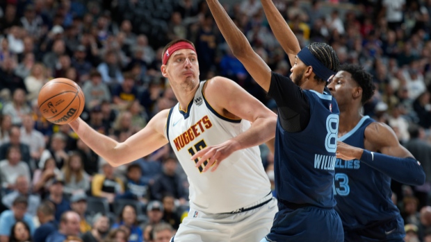 Jazz clinch playoff spot with OT win over Grizzlies