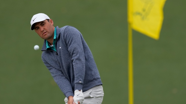 Scheffler survives wild, windy cold day to lead Masters by 3
