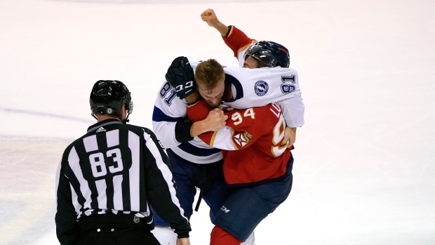 Erik Cernak fights Ryan Lomberg