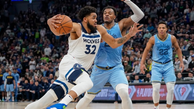 Karl-Anthony Towns Xavier Tillman, The Canadian Press Karl-Anthony Towns Xavier Tillman