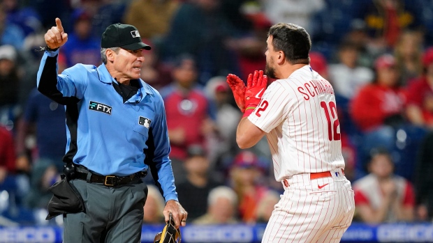 Angel Hernandez and Kyle Schwarber