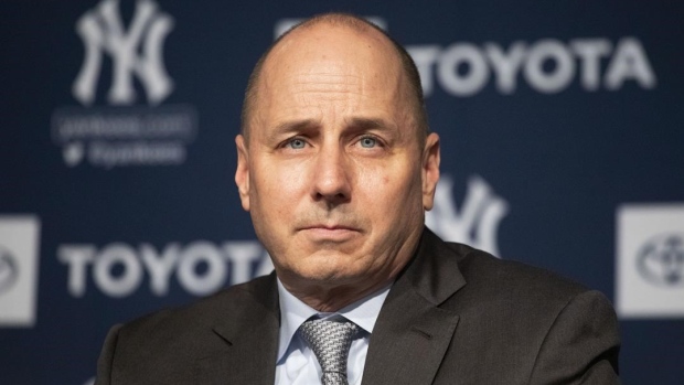 Brian Cashman , The Canadian Press Brian Cashman