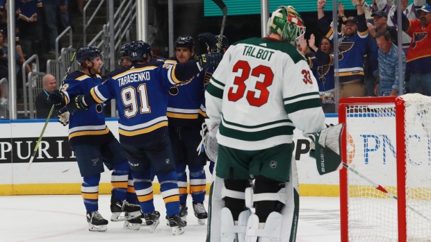St. Louis Blues celebrate in front of Cam Talbot