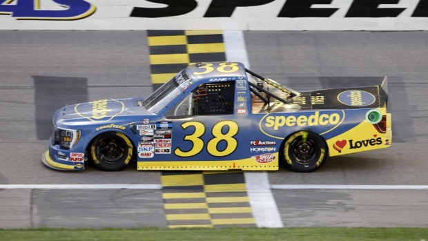 Smith drives away on restart to win Trucks race at Kansas Article Image 0, The Canadian Press Smith drives away on restart to win Trucks race at Kansas Article Image 0