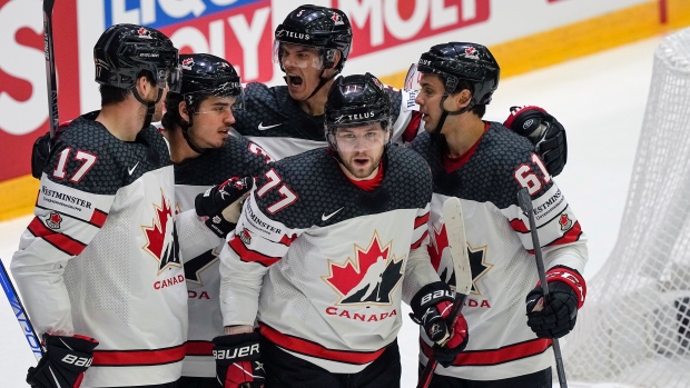 Team Canada celebrates, The Canadian Press Team Canada celebrates