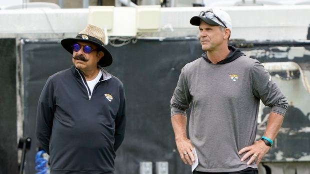 Shad Khan, Trent Baalke, The Canadian Press Shad Khan, Trent Baalke