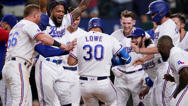 Nathaniel Lowe and Texas Rangers celebrate