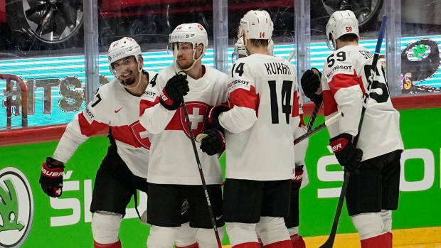 Switzerland celebrates, The Canadian Press Switzerland celebrates