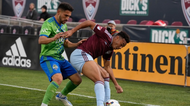 Cristian Roldan, Jonathan Lewis , The Canadian Press Cristian Roldan, Jonathan Lewis
