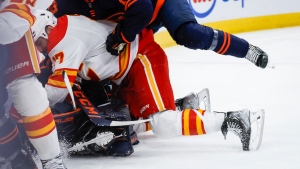 Flames' Lucic gets five and a game for charging Smith