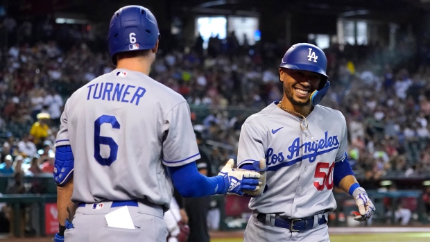Betts hits 2 of Dodgers' 5 homers in victory over Angels