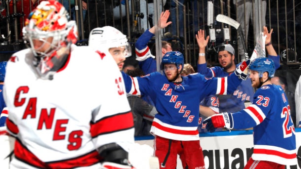 Andrew Copp celebrates vs. Hurricanes