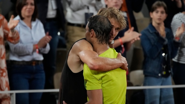 Spain's Rafael Nadal hugs Germany's Alexander Zverev
