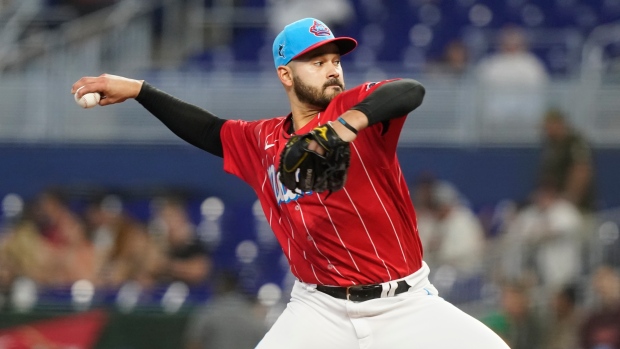 Chisholm, Sanchez injured, Reds again rally past Marlins in late innings