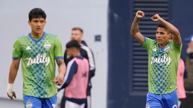 Seattle Sounders forward Raul Ruidiaz and Fredy Montero