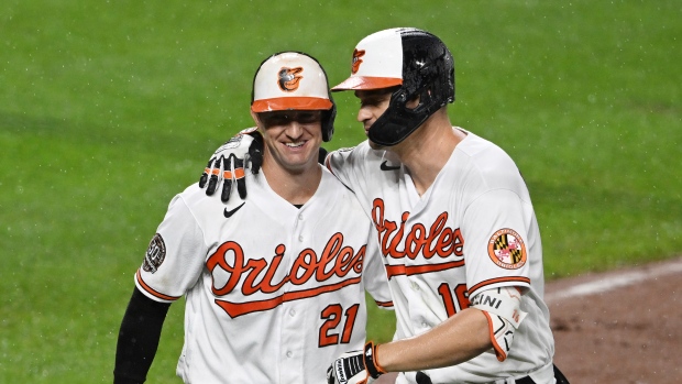 Austin Hays Trey Mancini , The Canadian Press Austin Hays Trey Mancini